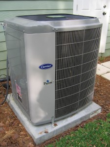 Figure 3. High-efficiency (SEER 16) air conditioner compressor unit. (Credit: PREC)