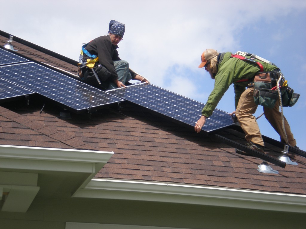 Figure 5. Rooftop mounted PV systems can be attached onto most residential roofing materials, like this asphalt shingle roof, with the proper mounting racks, fasteners, and associated accessories. Credit: Susan Bilo, Outside Photographer / Courtesy of NREL.